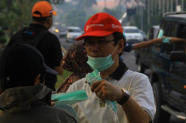 Di Pekanbaru Sinar Mas Group Bagikan 2.014 Masker