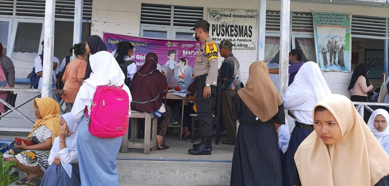 Polsek Teluk Meranti Lakukan Penjagaan di Gerai Vaksinasi Wilkum