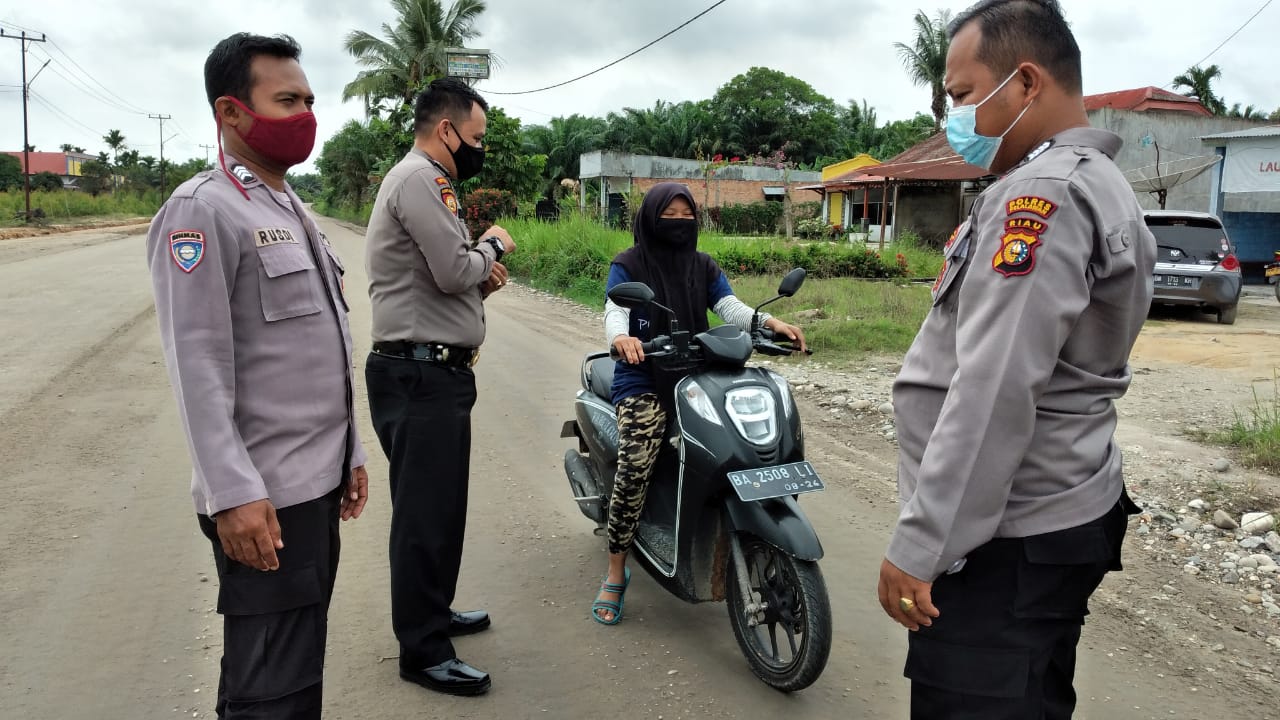 Lindungi Warga Dari Covid-19, Polsubsektor Pelalawan Gencar Gelar Operasi Yustisi