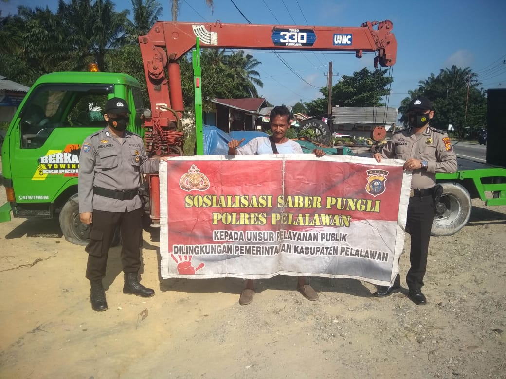 Berantas Pungli, Polsek Bandar Sei Kijang Sosialisasi Kepada Warga