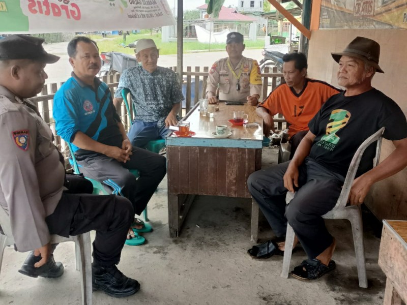 Bhabinkamtibmas Polsek Sungai Batang Gelar Cooling System Jelang Pilkada 2024 untuk Jaga Keamanan dan Ketertiban