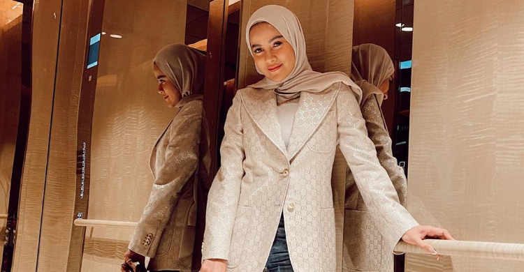 Olla Ramlan, Buang Nama Suami