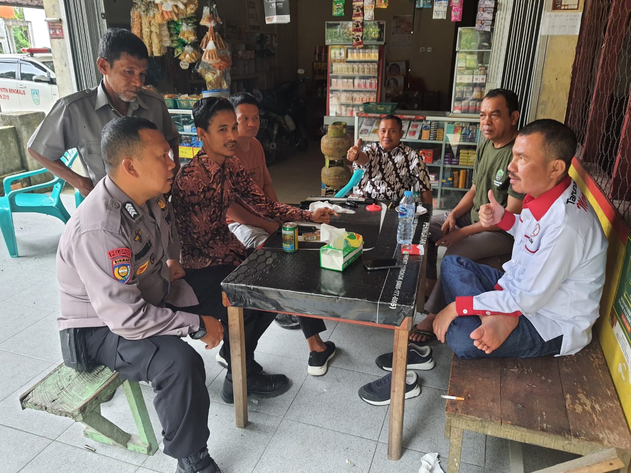Bhabinkamtibmas Polsek Pinggir Gelar Sosialisasi Cooling System di Desa Muara Basung