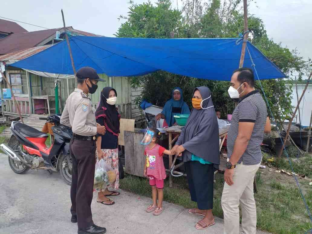 Polsek Teluk Meranti Kerahkan Anggota  Sosialisasikan Prokes