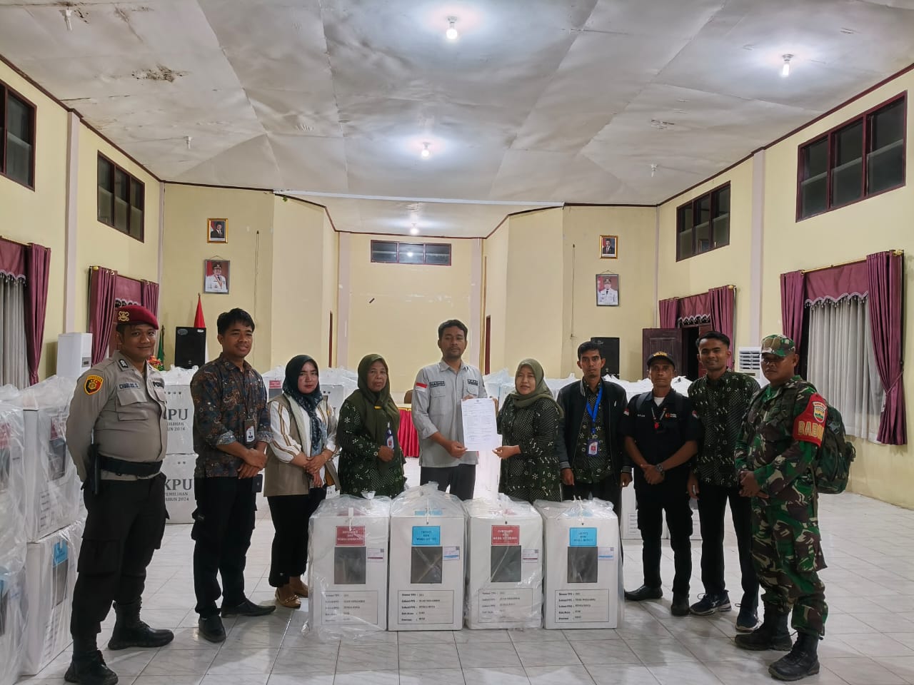 Pengawalan Logistik Pilkada 2024 di Kecamatan Bunga Raya Berlangsung Aman dan Lancar