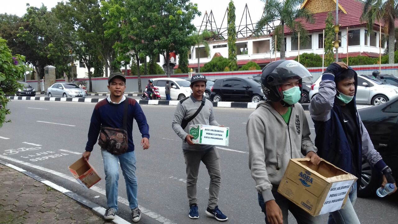 Pemko Pekanbaru tak Kunjung Lunasi Tunggakan Listrik Jalan, Mahasiswa Lakukan Aksi Kumpul Koin
