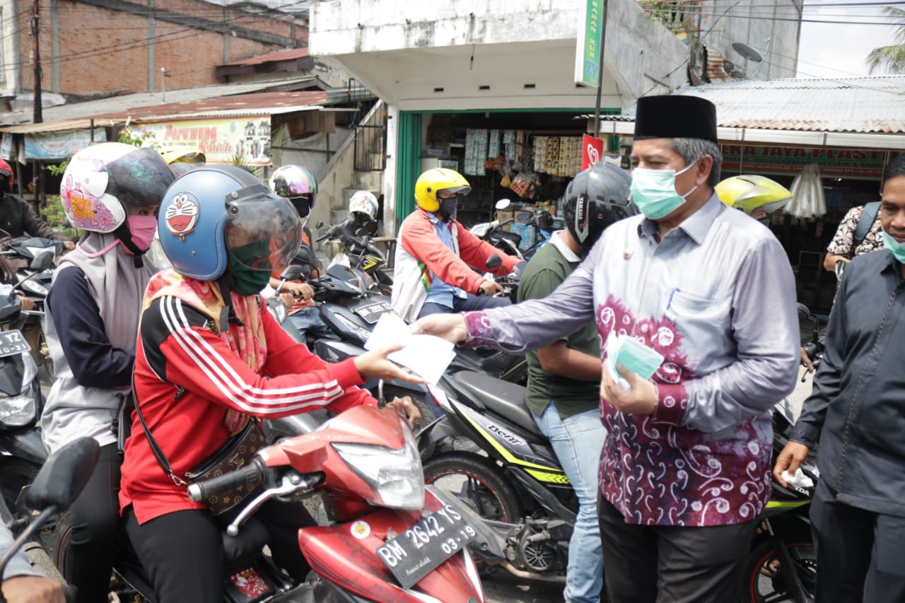 Guna Memutus Penularan Covid-19, Bupati Siak dan Kapolres Launching  Kawasan Wajib Helm dan Masker