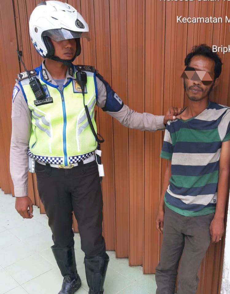 'Pak Ogah' Kucingan-kucingan Saat Ditertibkan Polisi