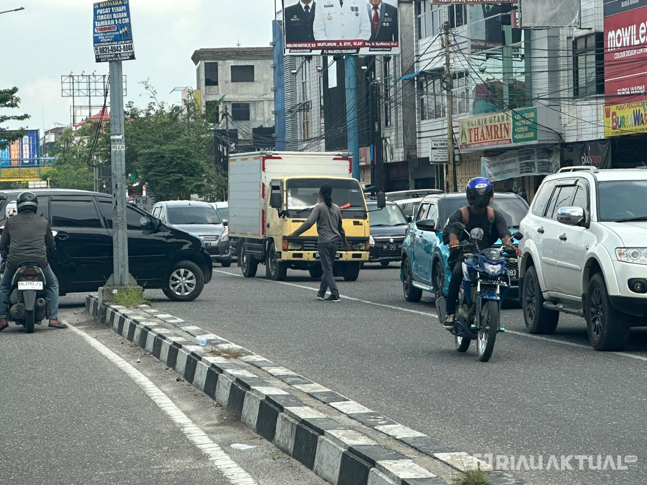 Pak Ogah Kian Meresahkan, Warga Minta Penertiban di Sejumlah Ruas Jalan Pekanbaru