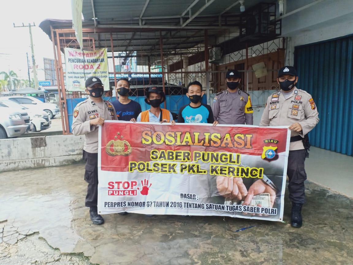 Polsek Pangkalan Kerinci Lakukan Sosialisasi Saber Pungli Kepada Petugas Parkir