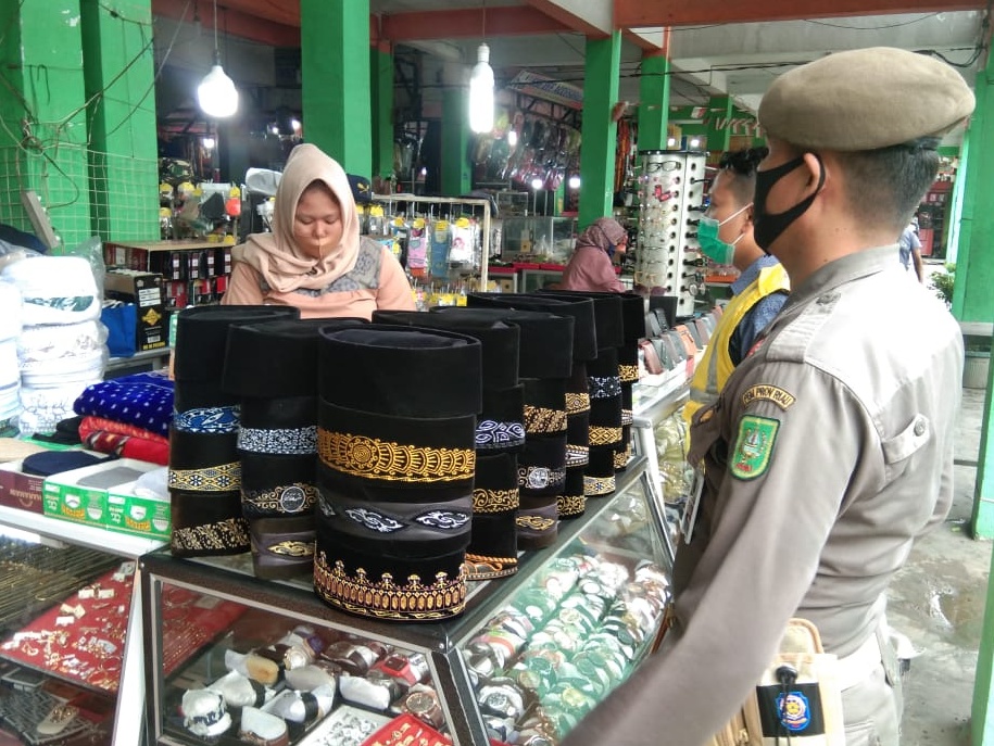 Ribuan Warga dan Pelaku Usaha di Pekanbaru Belum Patuh Pakai Masker