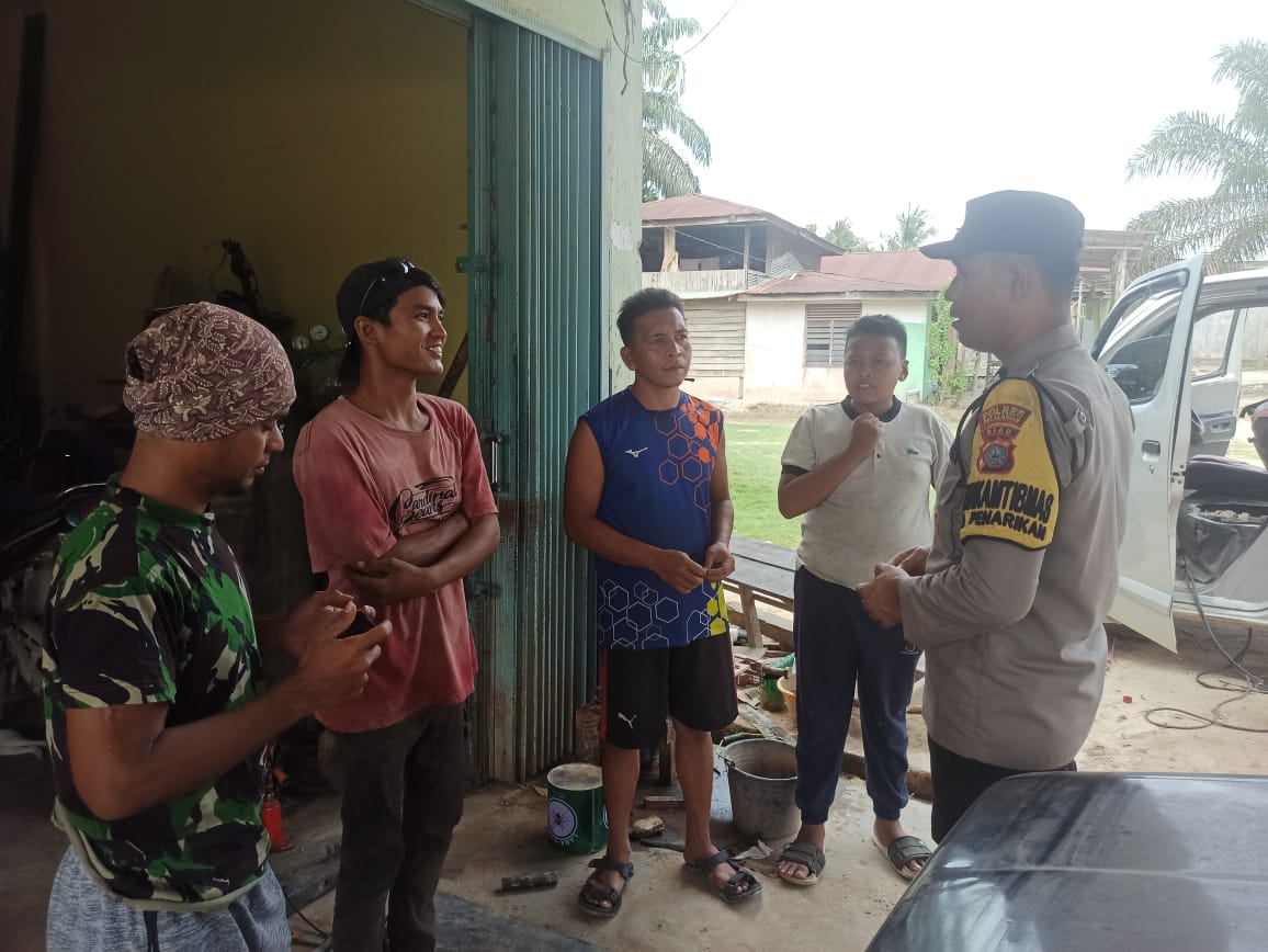 Jelang Pencoblosan Pilkada, Polsek Langgam Gencar Sambangi Warga