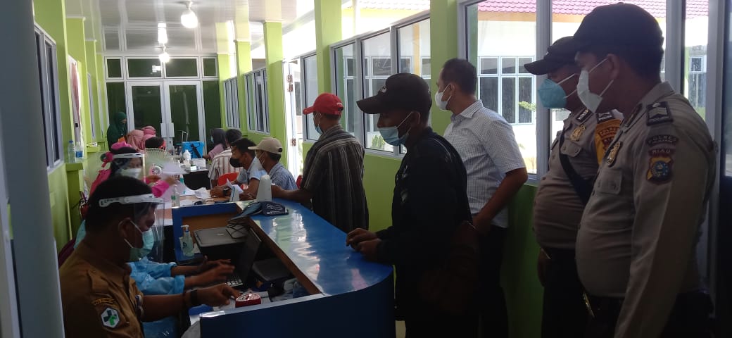 Polsek Kuala Kampar Lakukan Pengawalan Kegiatan Vaksinasi Dosis II