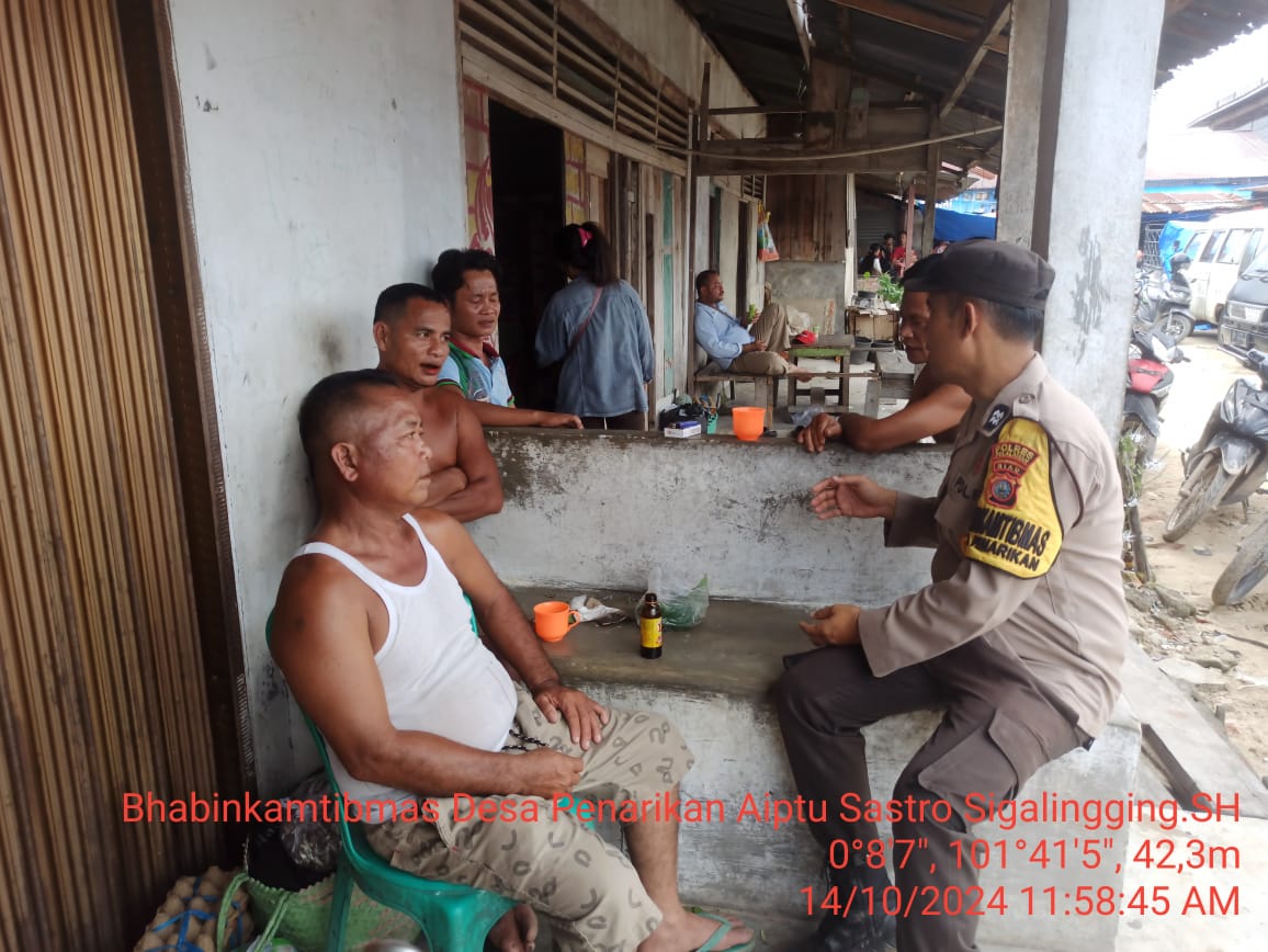 Polsek Langgam Jalin Keakraban dengan Warga Jelang Pilkada