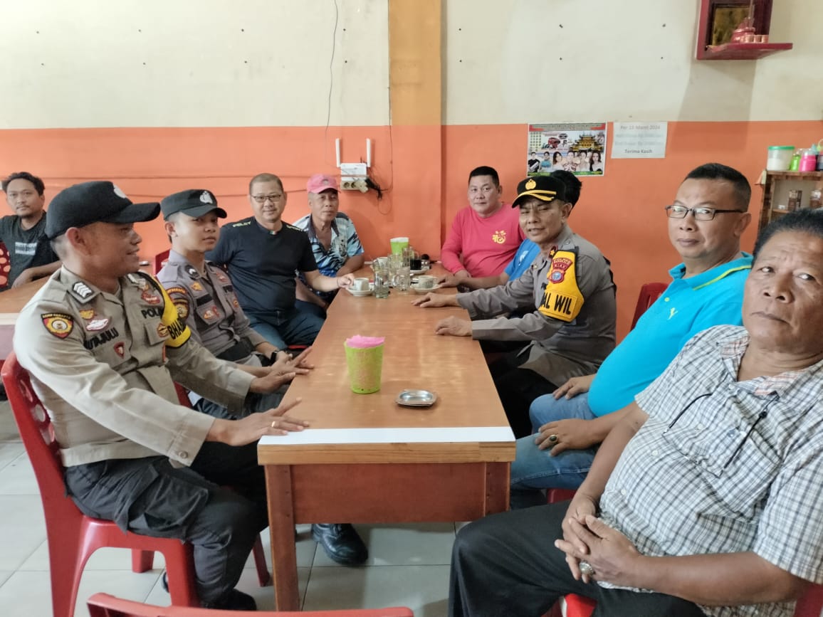 Kapolsek Bukit Batu Sambangi Warga Tionghoa, Tekankan Pentingnya Sinergi Hadapi Pilkada 2024
