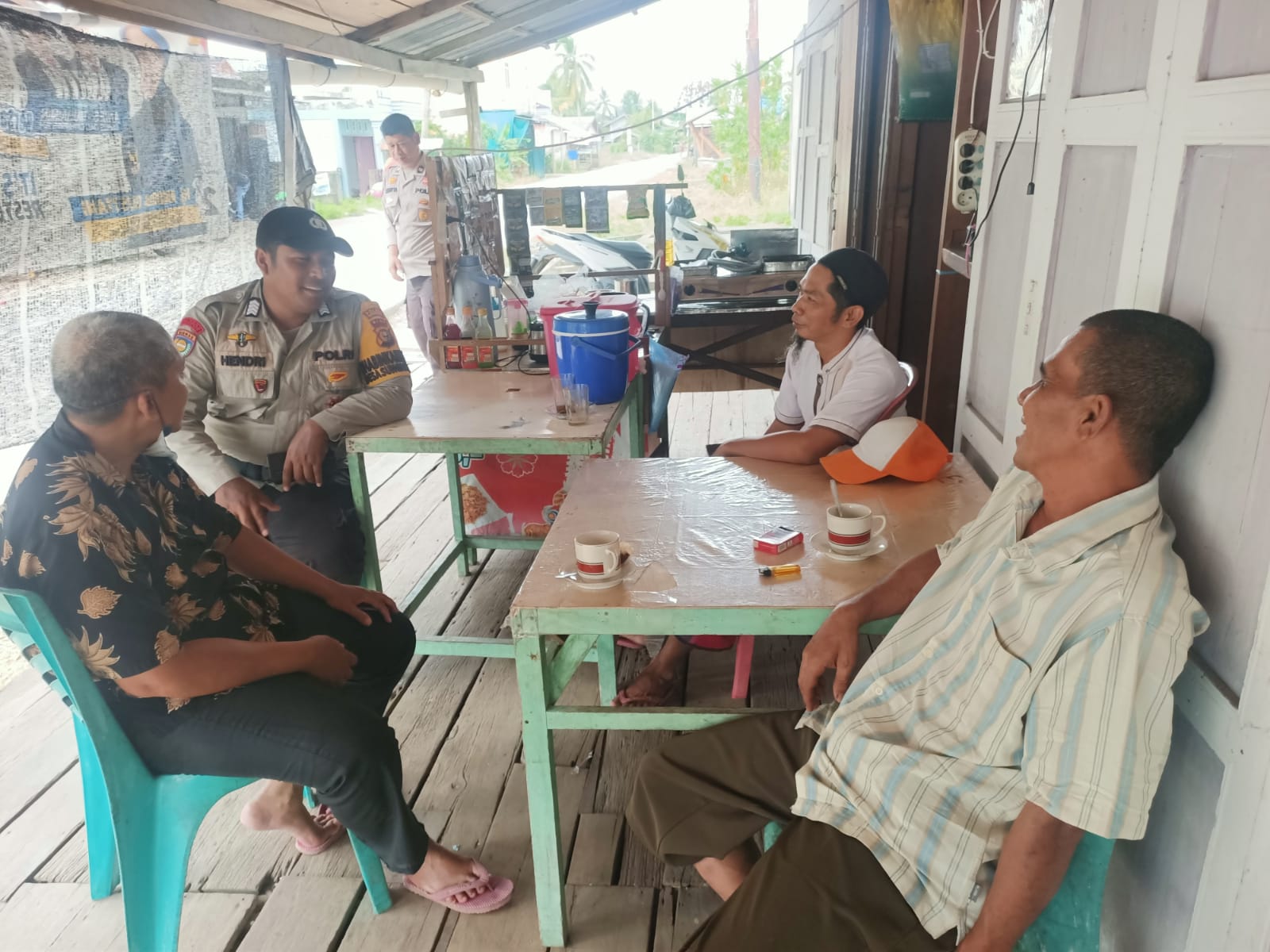 Bripka Hendri Mulyadi Cooling System dan Sosialisasi Pemilu Damai di Desa Sungai Dusun