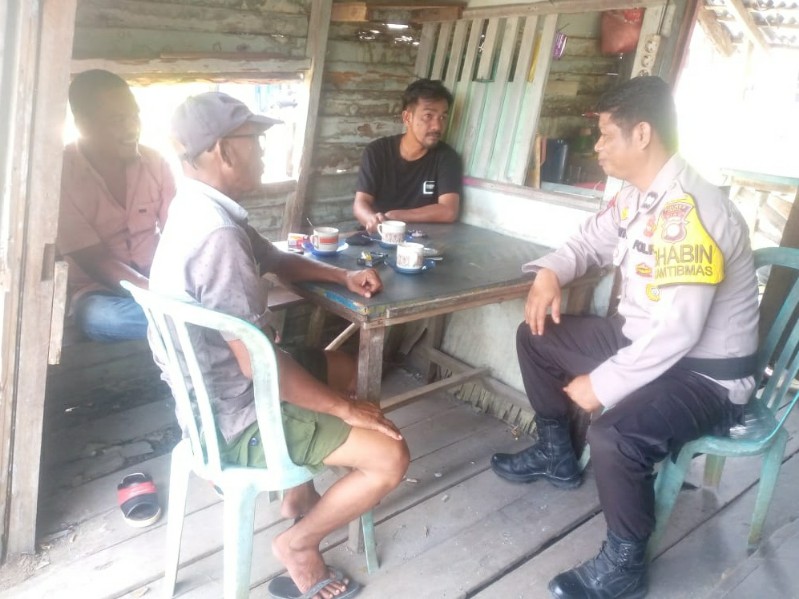 Cooling System di Batang Tuaka, Aiptu Wedita Ciptakan Pilkada Aman dan Damai