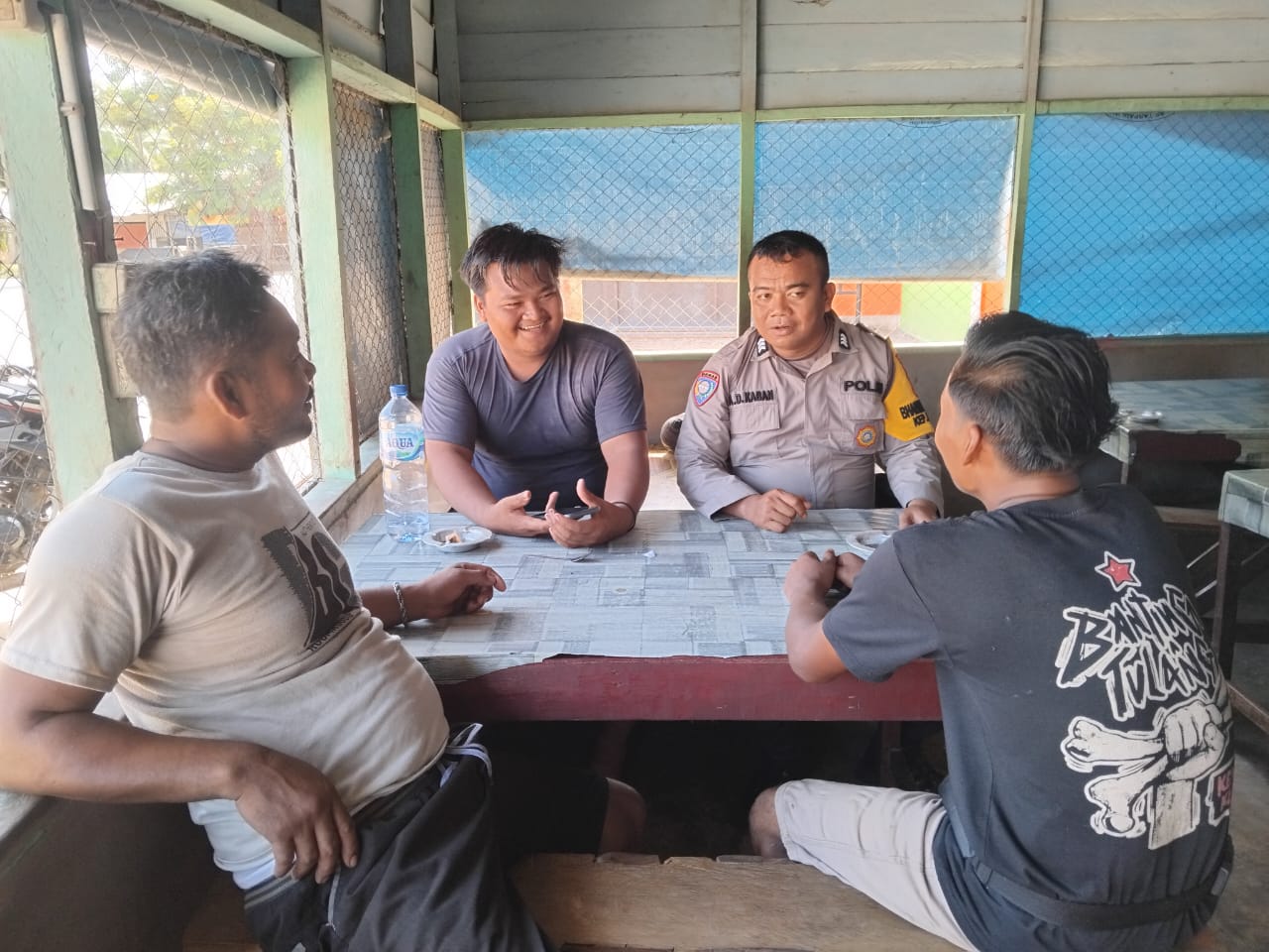 Bhabinkamtibmas Harapan Jaya Tegaskan Kondusifitas saat Masa Tenang Pilkada Rohil 2024