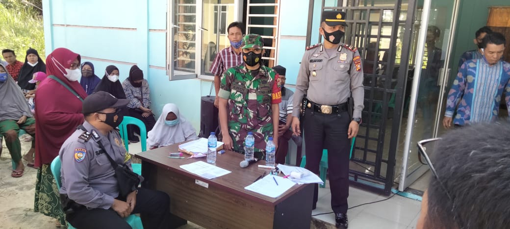 Kapolsek Bandar Sei Kijang Tinjau Giat Vaksinasi Puskemas dan Kantor Desa