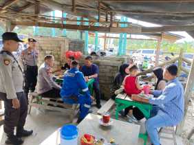 Polsek Minas Ajak Warga Dukung Pilkada Damai melalui Cooling System Kamtibmas di Minas Jaya