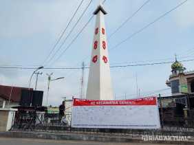 Spanduk Penolakan Relokasi Warga TNTN Terbentang di Tugu Proklamasi Cerenti