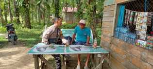 Bhabinkamtibmas Ajak Warga Barangan Sukseskan Pemilu di Inhu