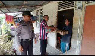 Polsek Mandau Peduli, Berikan Bantuan Kepada Warga Balai Makam