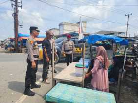 Patroli Kamtibmas Polsek Kempas Ingatkan Warga untuk Hadir ke TPS