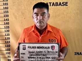 Dugaan Korupsi Rp1,4 Miliar SPPD Fiktif, Mantan Kasatpol PP Bengkalis Ditahan