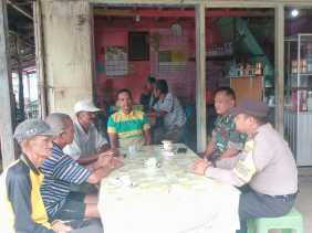 Babinkamtibmas dan Babinsa Bersinergi Jaga Keamanan Desa Kuala Lahang Jelang Pemilu 2024