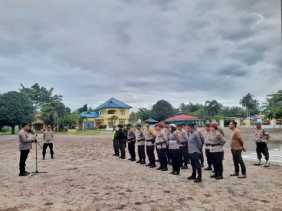 Kapolsek TPTM Pimpin Apel Kesiapsiagaan Pengamanan PPK Pasca Pilkada 2024 di Tanah Putih Tanjung Melawan