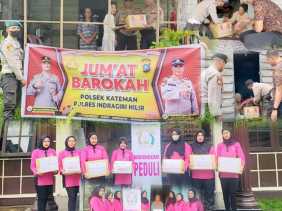 Kapolsek Kateman dan Bhayangkari Gelar Jumat Berkah dan Ciptakan Pemilu Damai