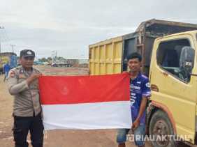 Sambut Hari Kemerdekaan, Kapolsek Rimba Melintang Ajak Warga Kibarkan Merah Putih